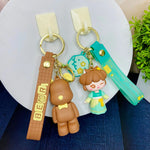 Load image into Gallery viewer, Adorable Girl and Teddy Premium Keychain